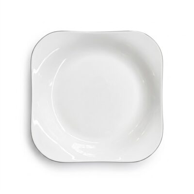 Farfurie albă pătrată din porțelan cu margini curbate și design minimalist