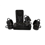 Set de cafea Malooki Midnight Marble din porțelan negru cu model de marmură albă, 12 piese, așezat pe fundal alb.