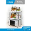 Raft organizator pentru bucătărie cu 2 polițe, așezat deasupra unui cuptor cu microunde, cu structură din oțel inoxidabil și polițe din plastic